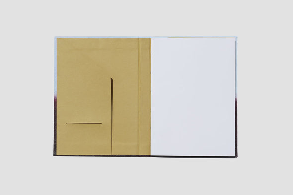 Straight-On shot showing the inside of the Hanaduri Gugimfolio with gold inside paper with pocket and slot for business card