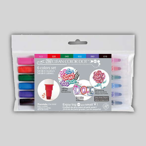 A set of six ZIG Clean Color Dot markers in pink, red, blue green, purple, and black.