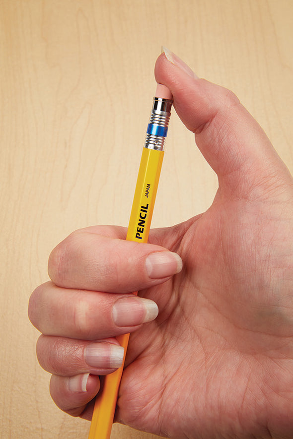 A thumb clicks the back of the pencil, to extend more lead from the front of the pencil.