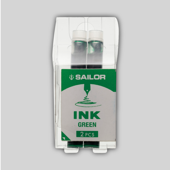 Two green ink cartridges in a package.