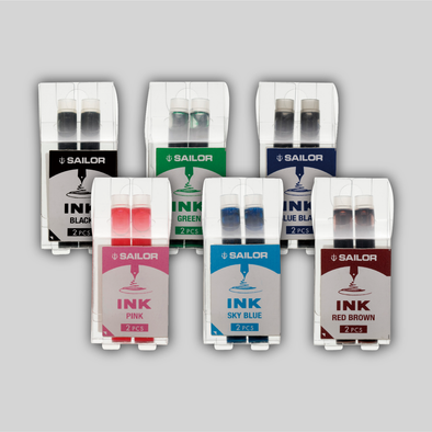 Shot showing two rows of 3 packages of Sailor ink, in black, green, dark blue, pink, sky blye, and red brown